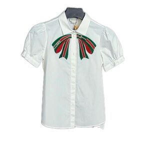 Authentic Gucci White and Red Label Detail